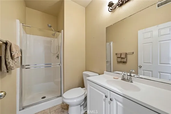 a view of an empty room and a window