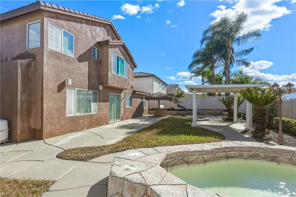 a view of a house with a swimming pool