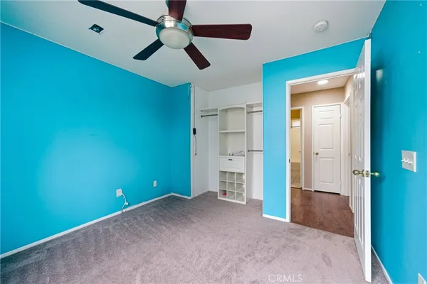 a spacious bathroom with a tub sink shower and mirror