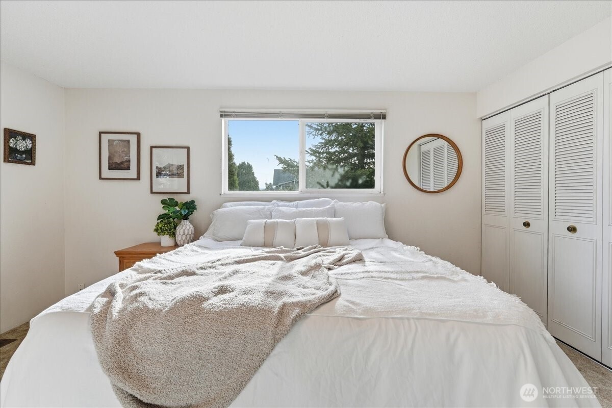 309 West Walnut Street Waterville, WA 98858 - Photo 9 of 28 a bedroom with a bed and a window