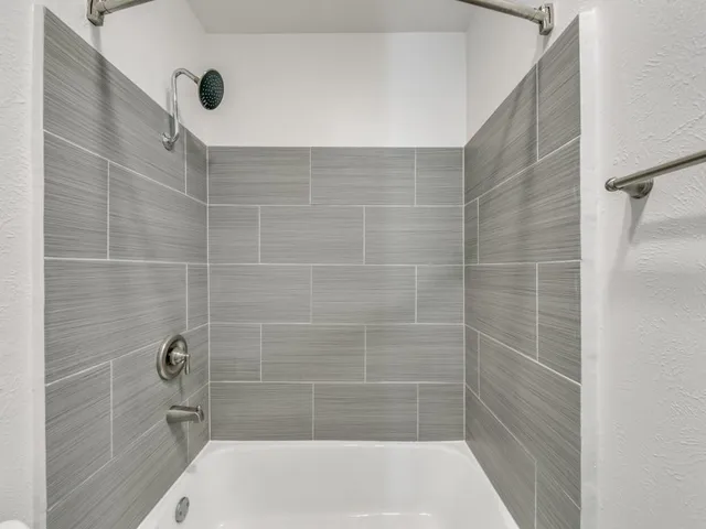 a bathroom with a bathtub