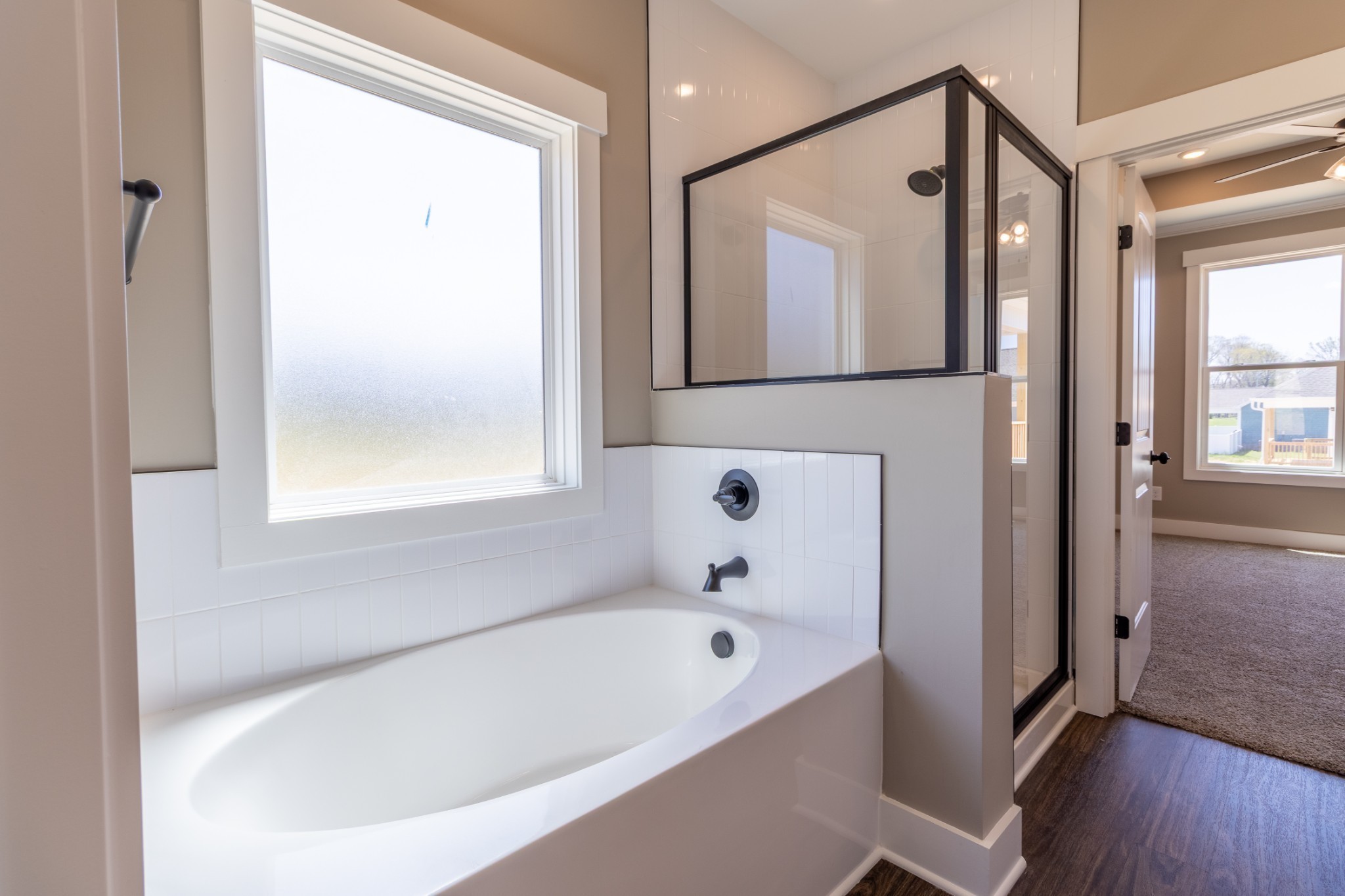 1137 Goose Drive Springfield, TN 37172 - Photo 19 of 28 a white bath tub sitting in a bathroom next to a window