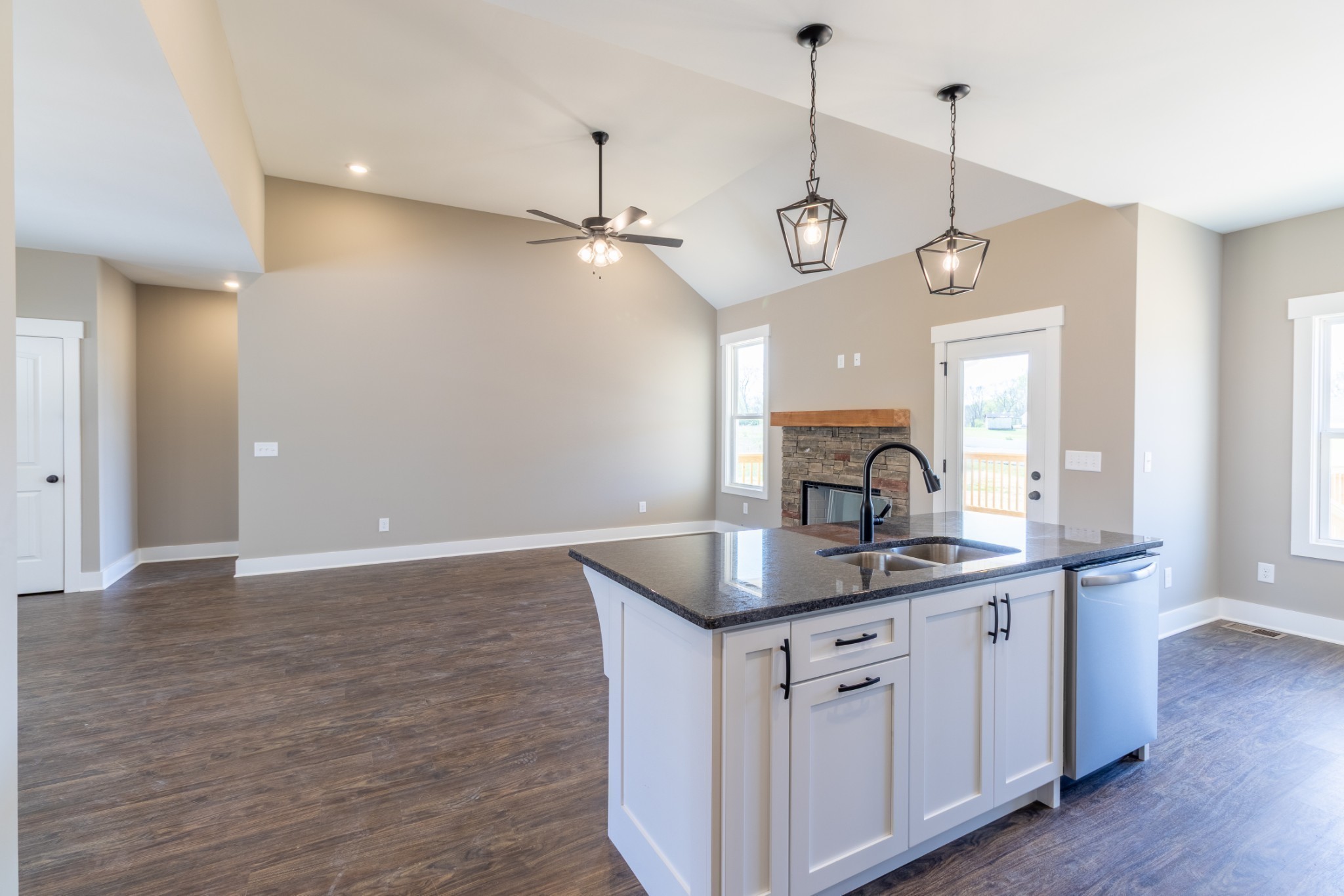 1137 Goose Drive Springfield, TN 37172 - Photo 24 of 28 a kitchen with a sink chandelier and wooden floor