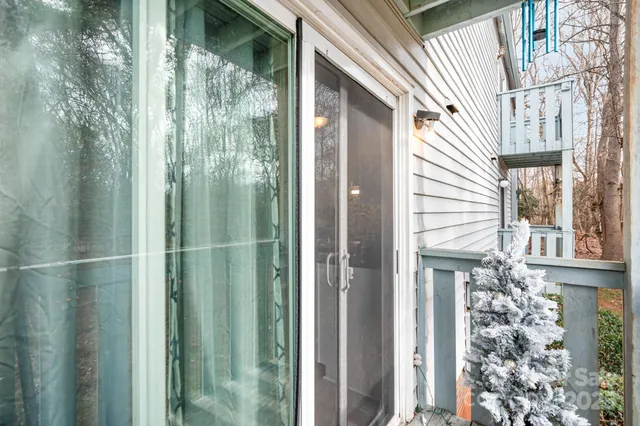 a view of a glass door and a window