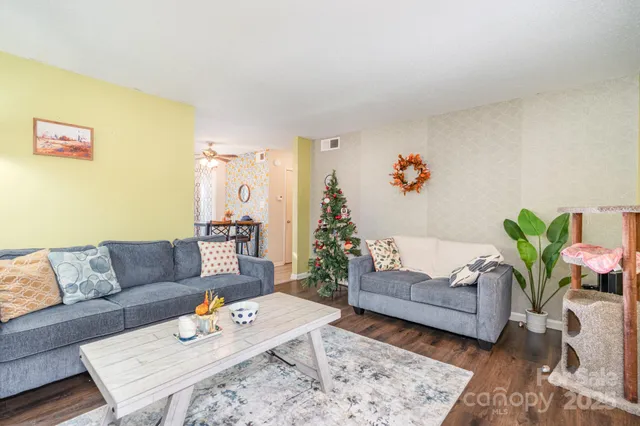 a living room with furniture and a couch