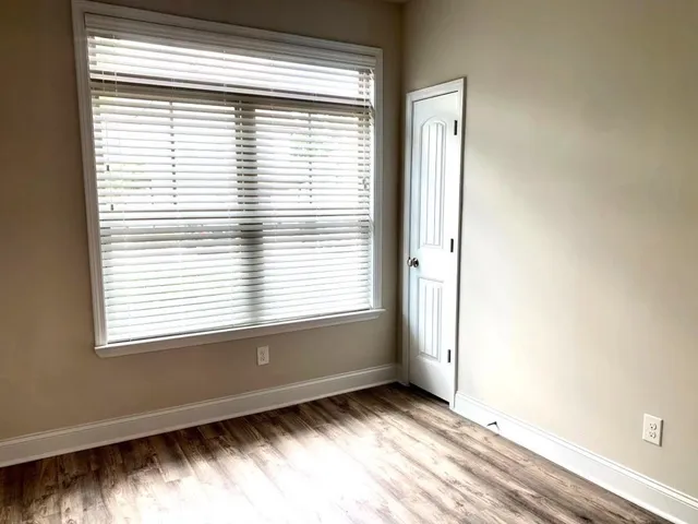 a view of an empty room and window