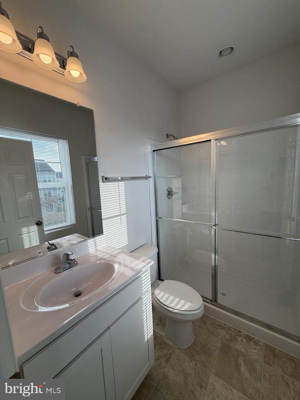 146 Galaxy Place Stephenson, VA 22656 - Photo 30 of 46 a bathroom with a sink toilet and shower