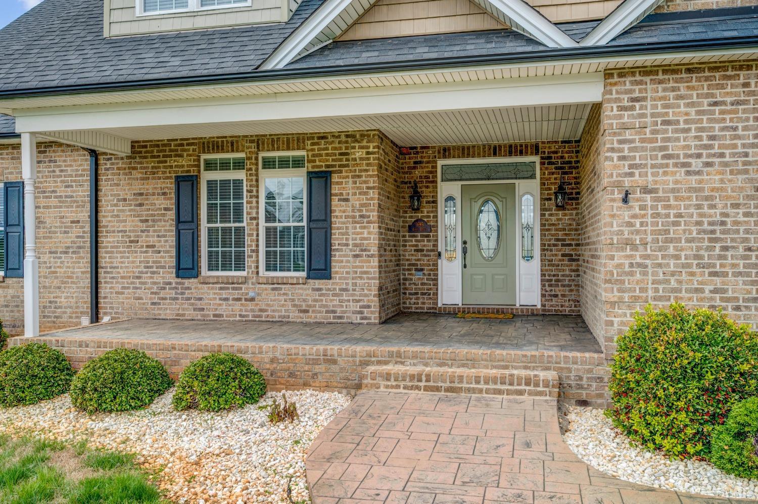 1695 Colby Drive Forest, VA 24551 - Photo 2 of 92 a front view of a house with garden