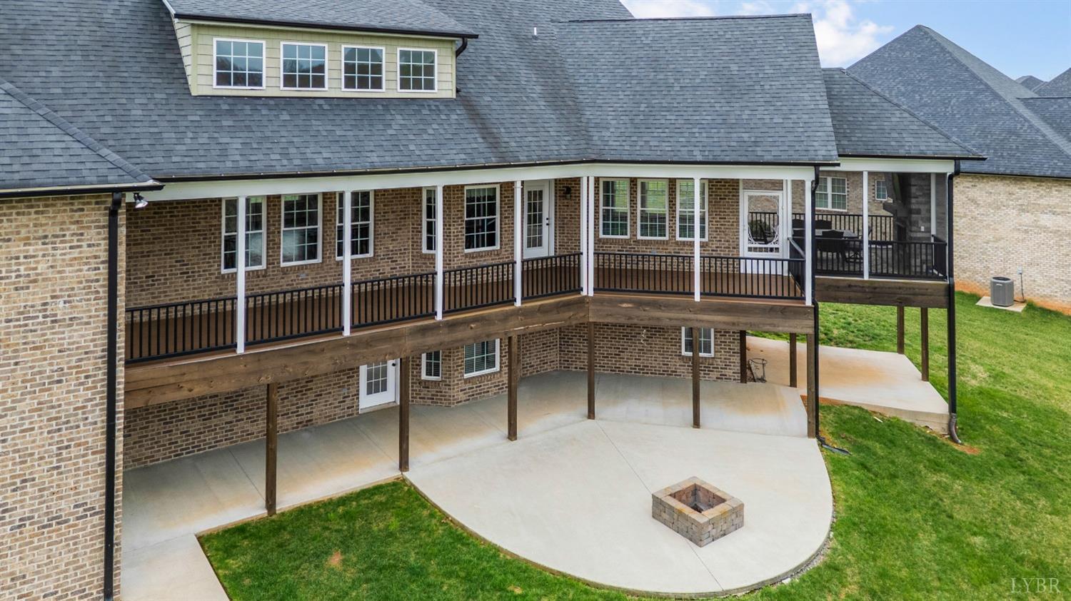 1695 Colby Drive Forest, VA 24551 - Photo 22 of 92 a view of a house with backyard porch and sitting area