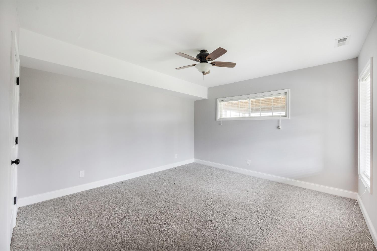 1695 Colby Drive Forest, VA 24551 - Photo 69 of 92 a view of room with a ceiling fan and window