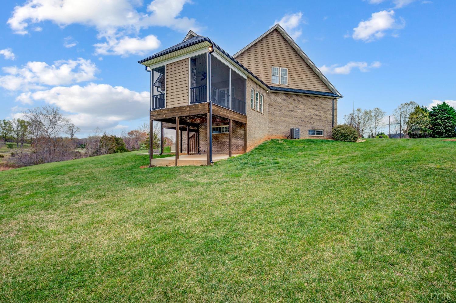 1695 Colby Drive Forest, VA 24551 - Photo 86 of 92 a front view of a house with garden
