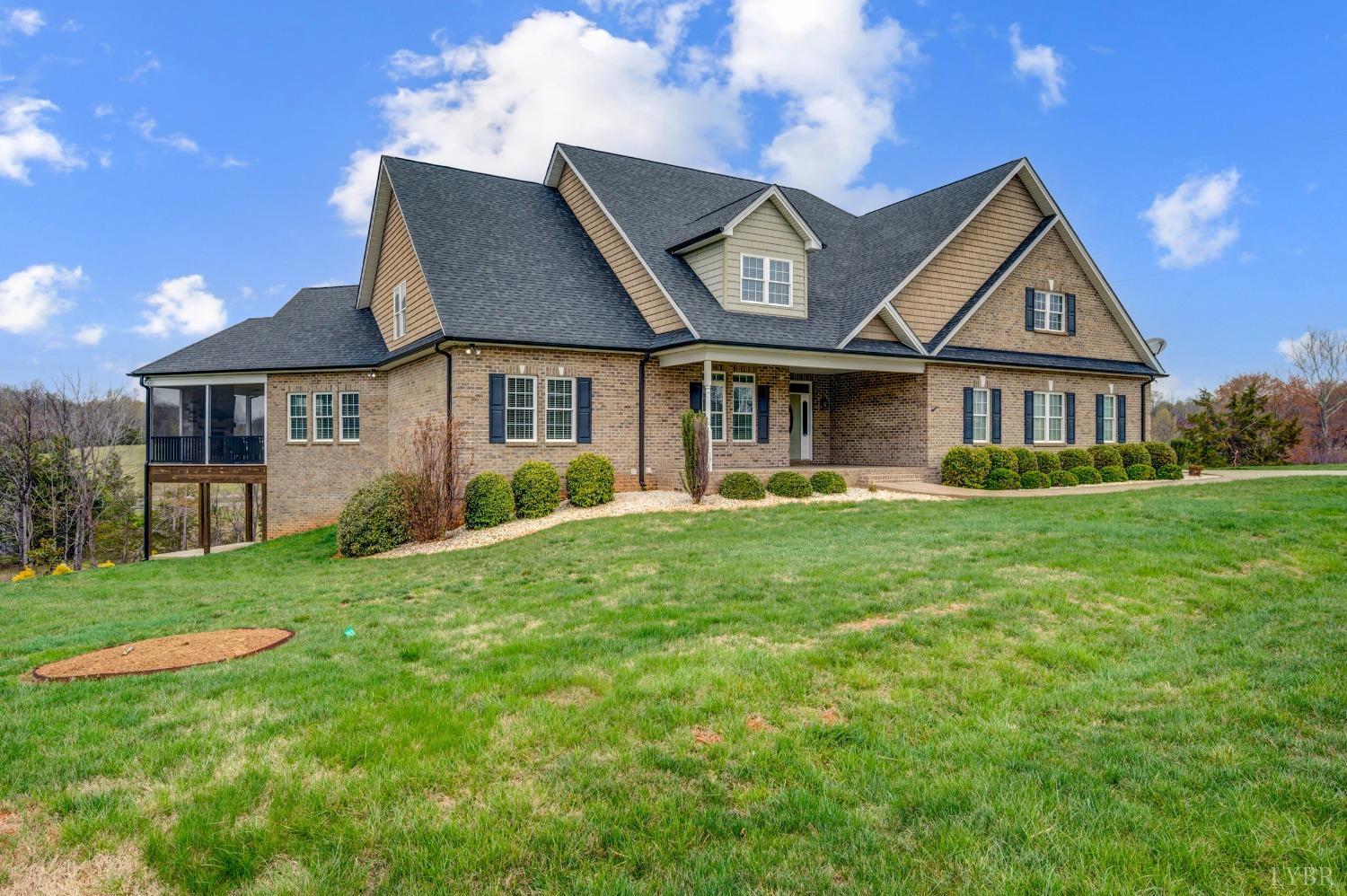 1695 Colby Drive Forest, VA 24551 - Photo 87 of 92 a front view of a house with a yard and green space