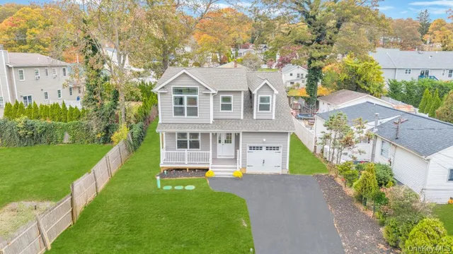a aerial view of a house with garden