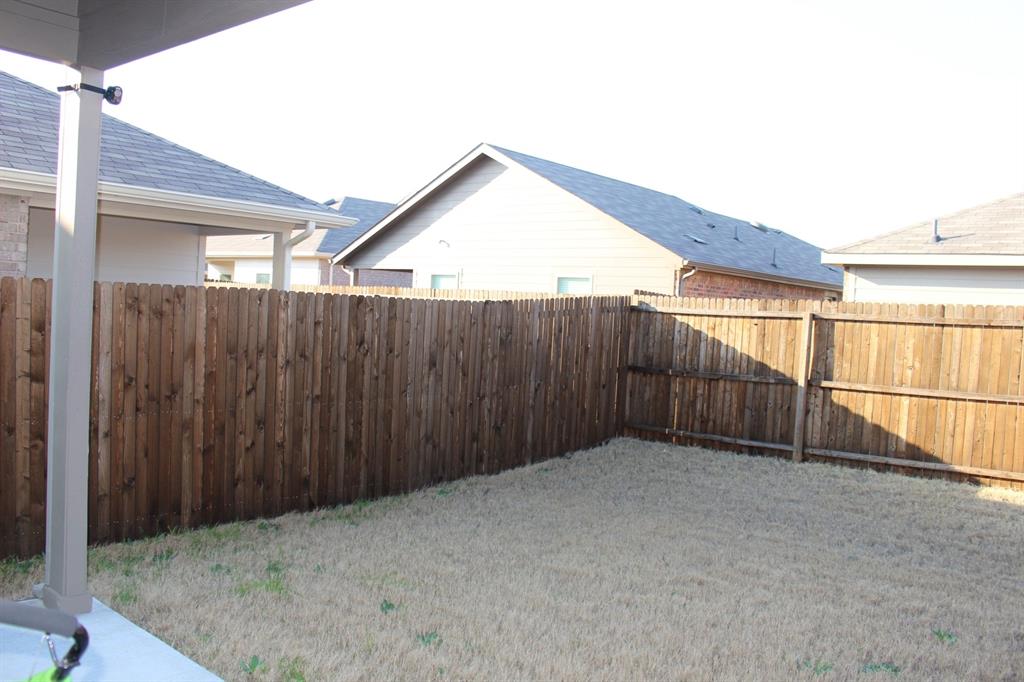 821 Country Road Royse City, TX 75189 - Photo 14 of 15 a view of a backyard