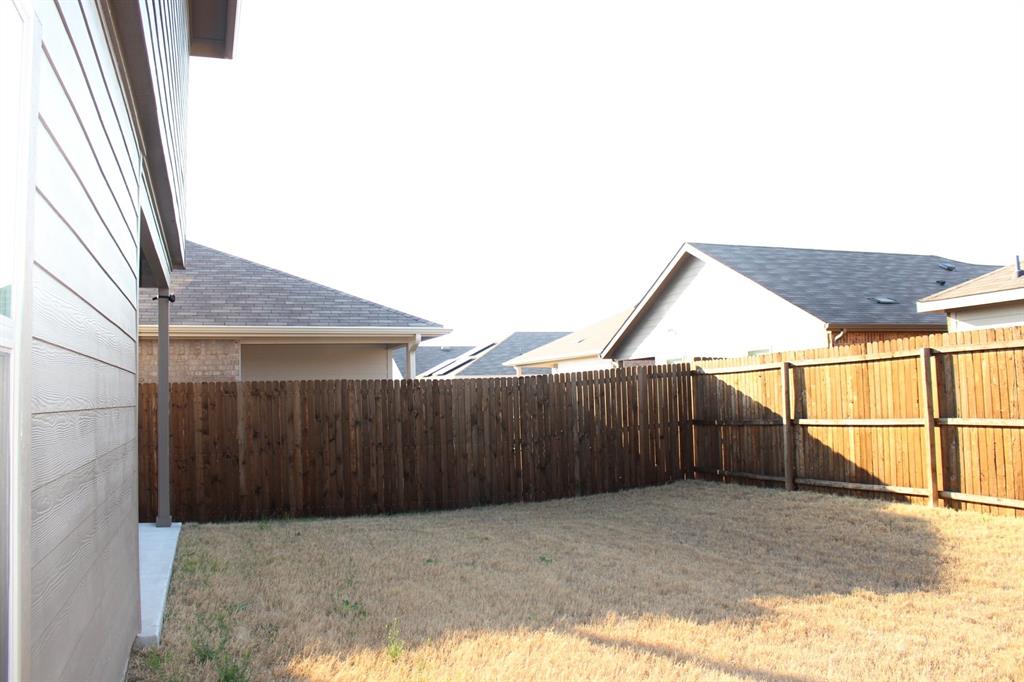 821 Country Road Royse City, TX 75189 - Photo 15 of 15 a backyard of a house
