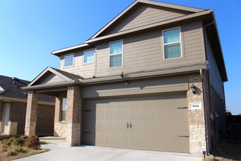 821 Country Road Royse City, TX 75189 - Photo 2 of 15 a house that has a lot of windows