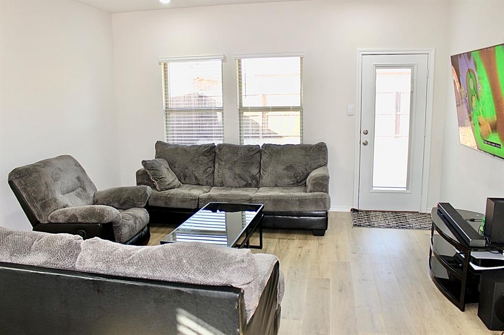 821 Country Road Royse City, TX 75189 - Photo 5 of 15 a living room with furniture and a window