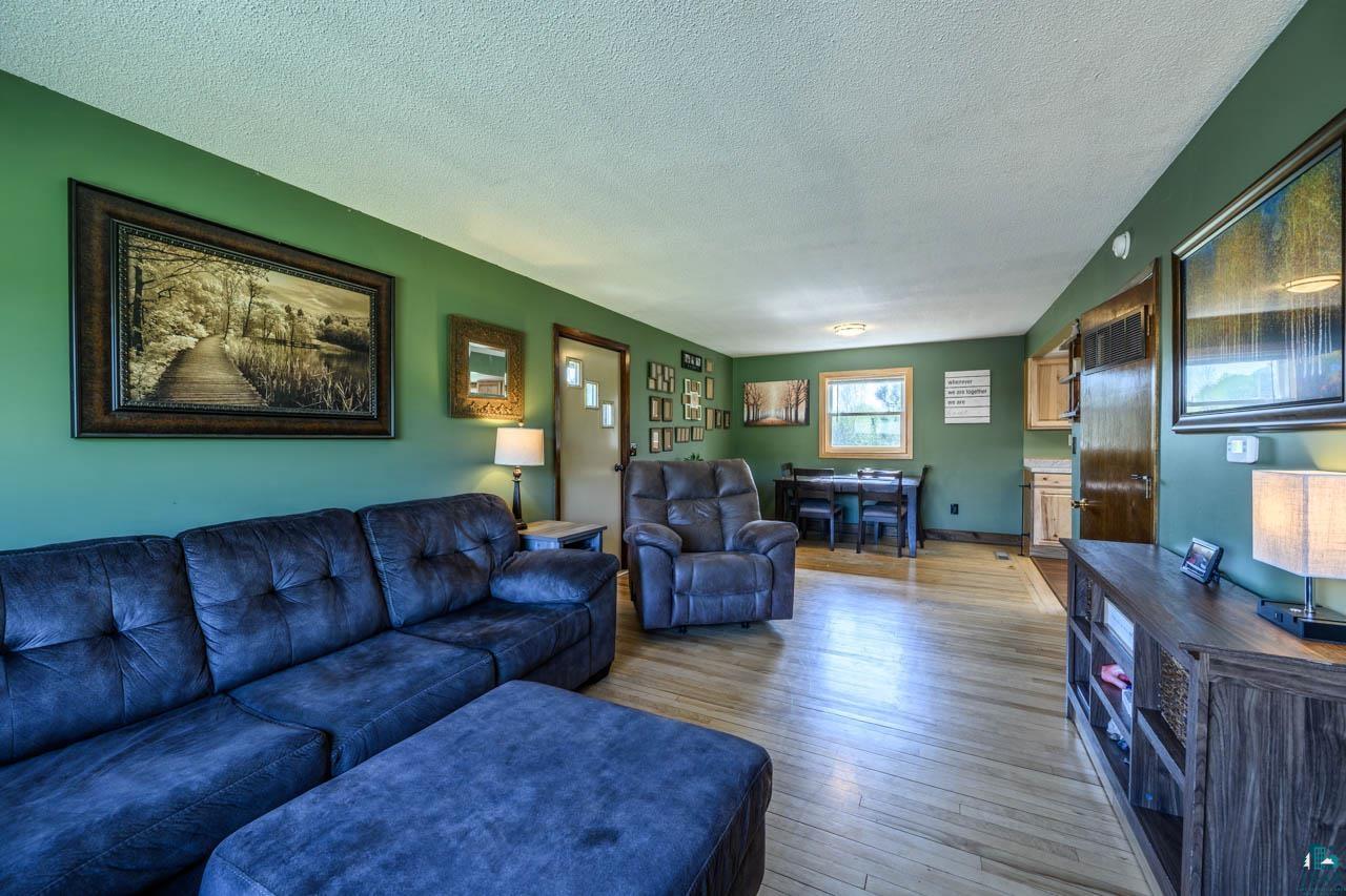 2581 O'Rourke Road Hibbing, MN 55746 - Photo 3 of 61 Open-concept living area featuring light wood-finish flooring