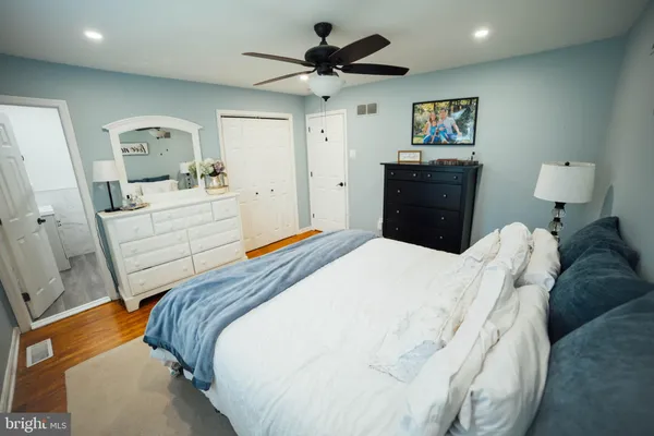 a view of a bedroom with baby bed