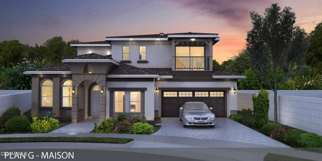 a car parked in front of a house