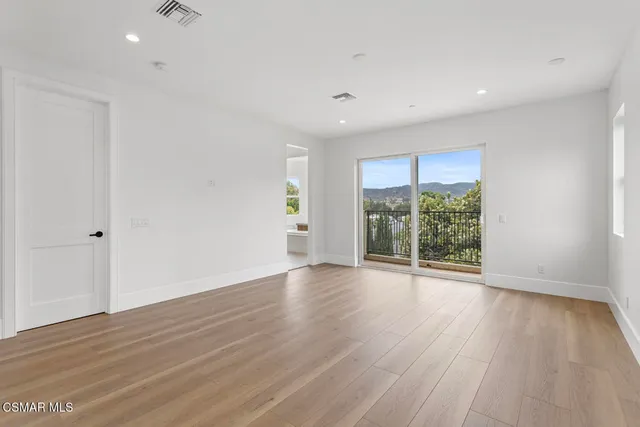 a bathroom with a bathtub and a sink