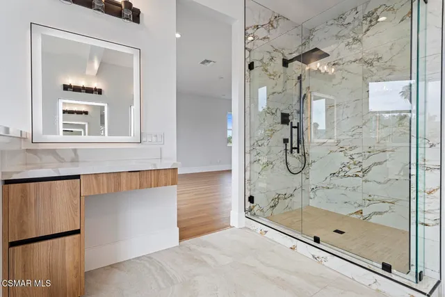 a view of a city skyline from a balcony