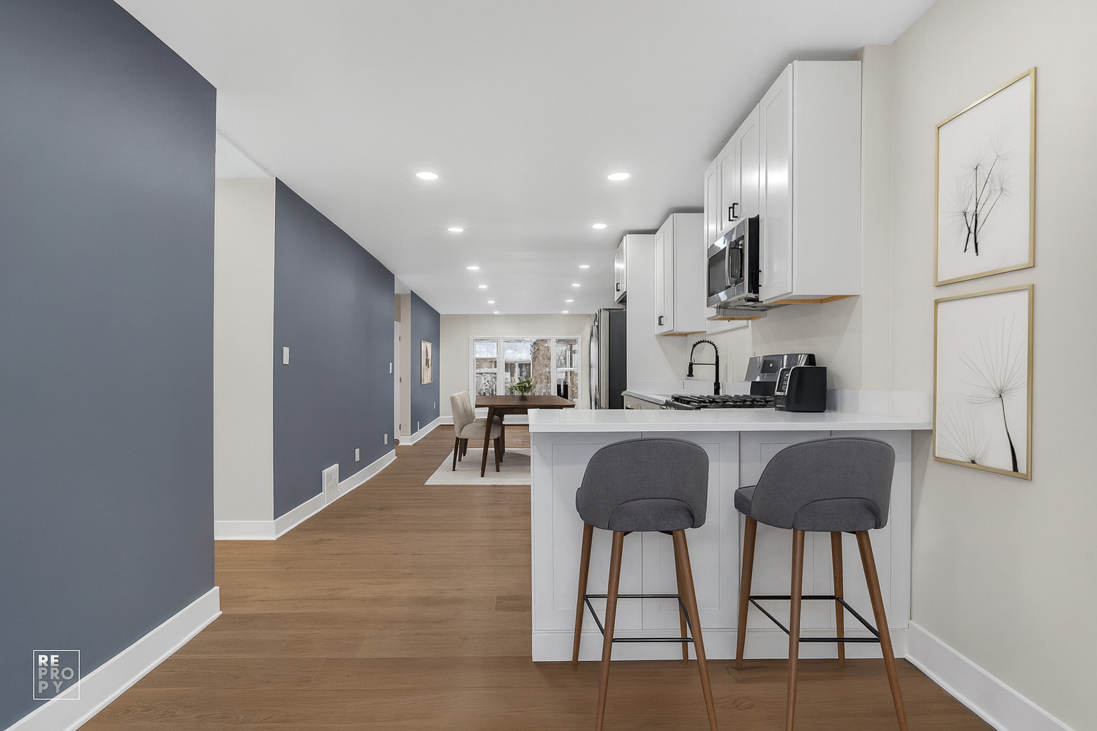 8420 South Carpenter Street Chicago, IL 60620 - Photo 7 of 23 a kitchen with stainless steel appliances granite countertop a refrigerator and microwave