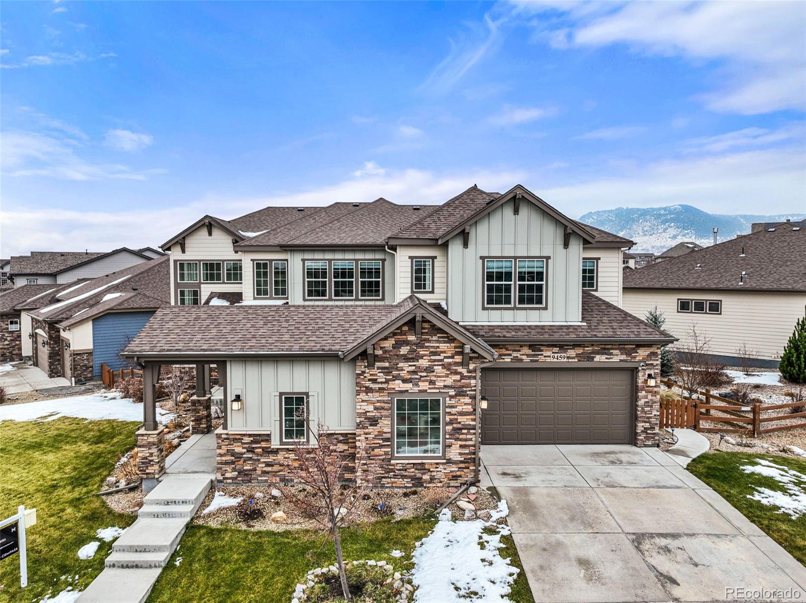 9459 Gore Loop Arvada, CO 80007 - Photo 1 of 50 a front view of a house with a yard