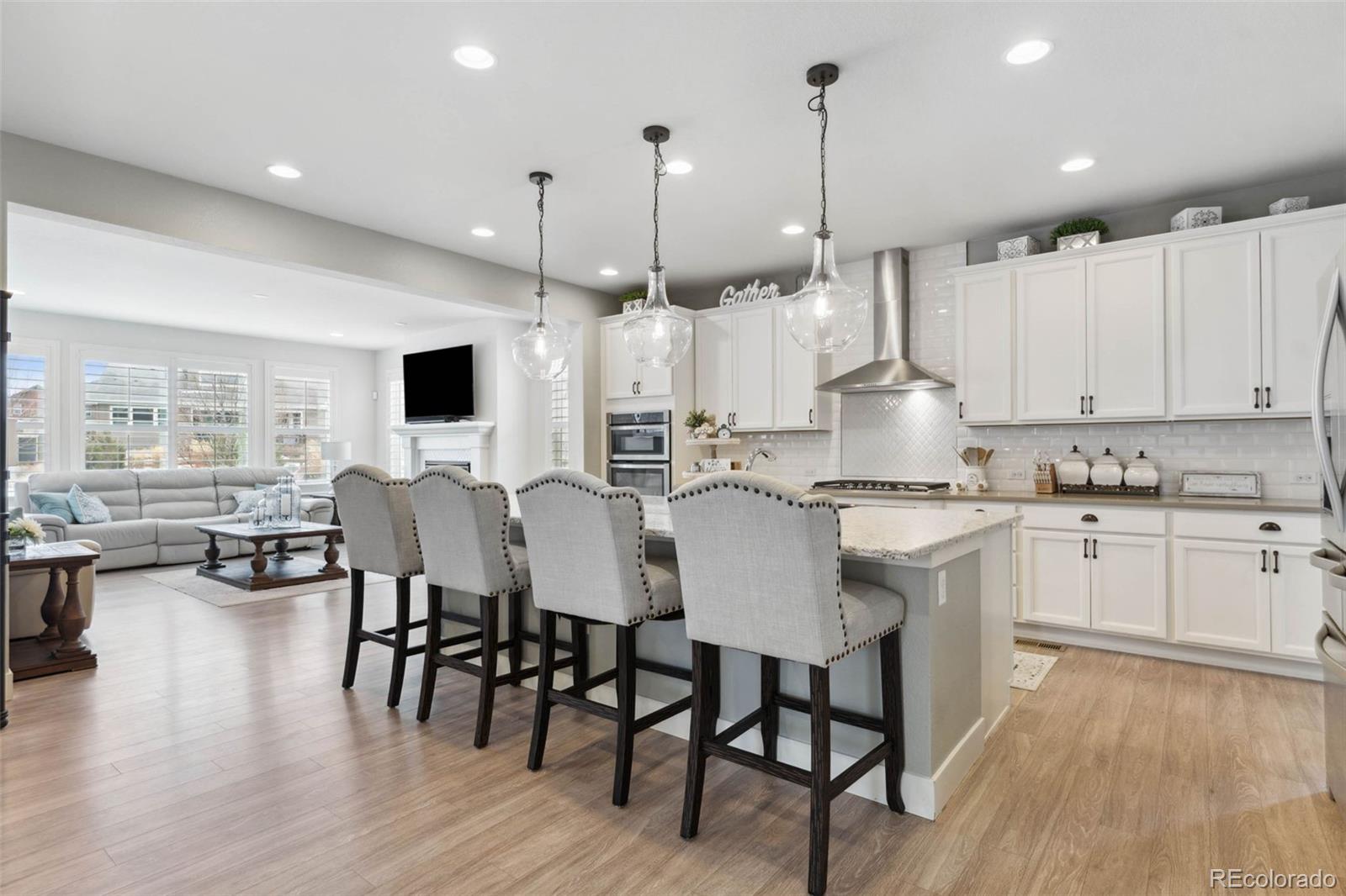 9459 Gore Loop Arvada, CO 80007 - Photo 16 of 50 a view of kitchen with breakfast area