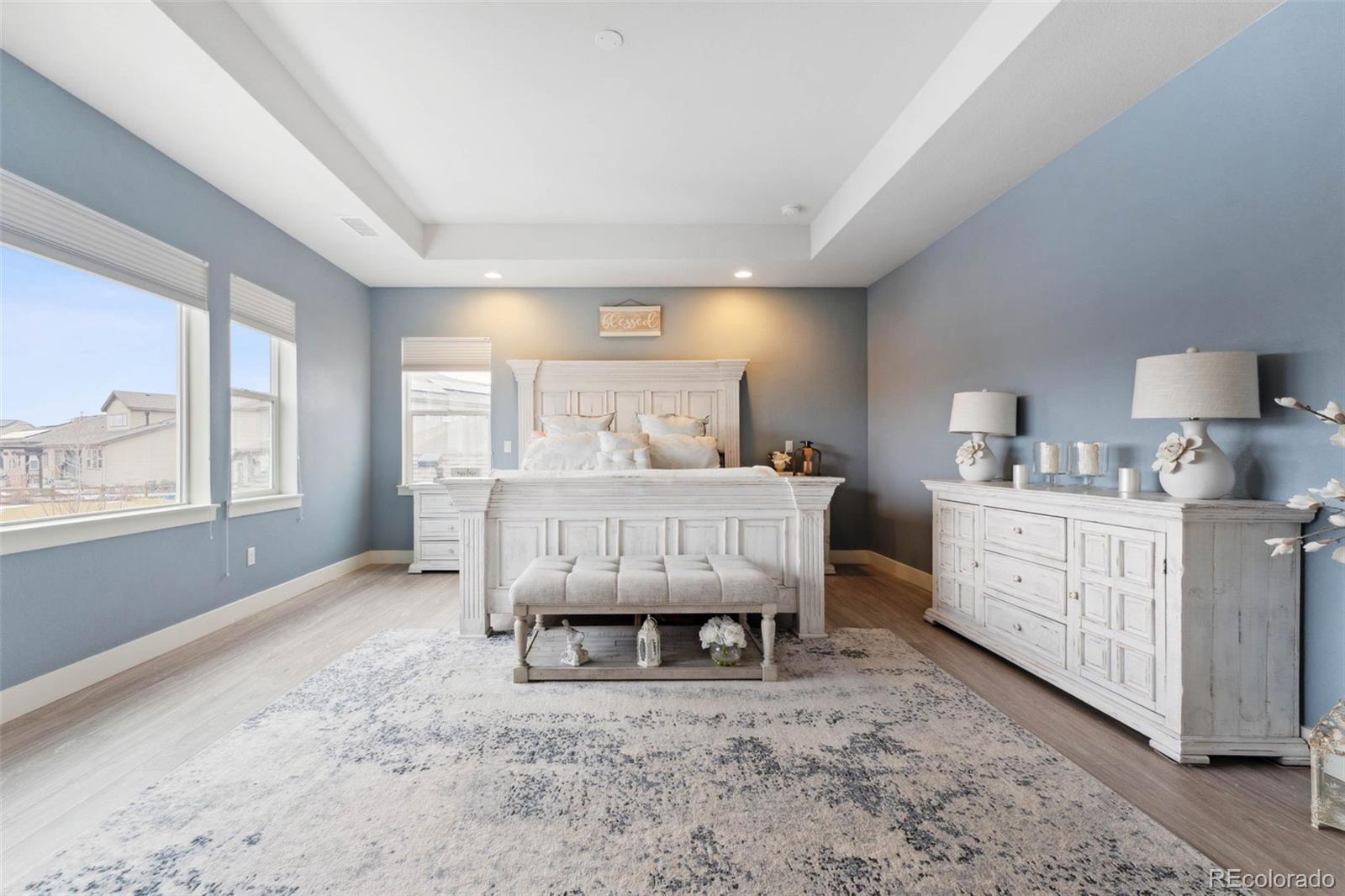 9459 Gore Loop Arvada, CO 80007 - Photo 24 of 50 a bed room with furniture and a window