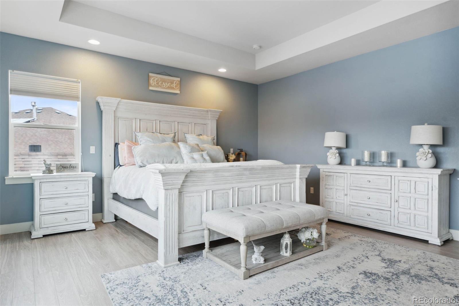 9459 Gore Loop Arvada, CO 80007 - Photo 25 of 50 a bedroom with a bed and a dresser