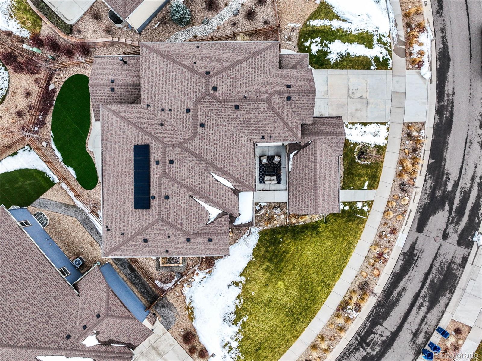 9459 Gore Loop Arvada, CO 80007 - Photo 50 of 50 an aerial view of a house with a garden and plants