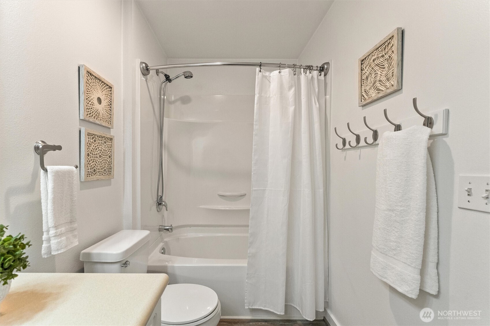 15150 140th Way Southeast, Unit S103 Renton, WA 98058 - Photo 14 of 40 a bathroom with a sink toilet and shower