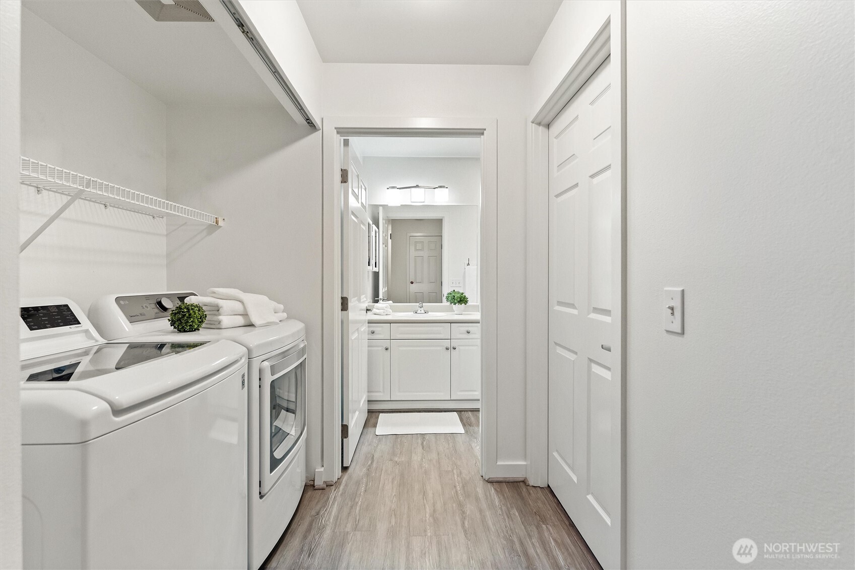 15150 140th Way Southeast, Unit S103 Renton, WA 98058 - Photo 15 of 40 a room with a washer and dryer