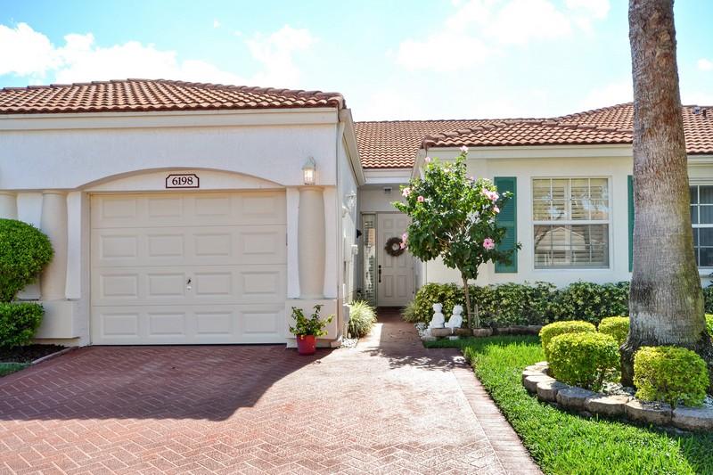 6198 Heliconia Road Delray Beach, FL 33484 - Photo 3 of 10 Front View