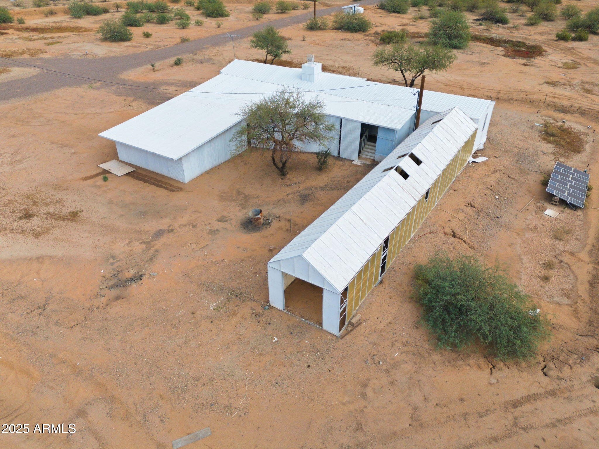 9156 South Thornton Road Casa Grande, AZ 85193 - Photo 23 of 24 an aerial view of residential house with outdoor space