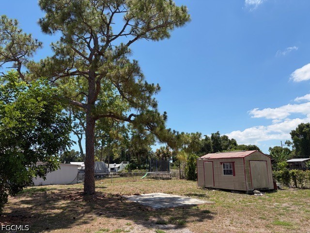2175 Twin Brooks Road North Fort Myers, FL 33917 - Photo 18 of 27 a view of a house with a yard