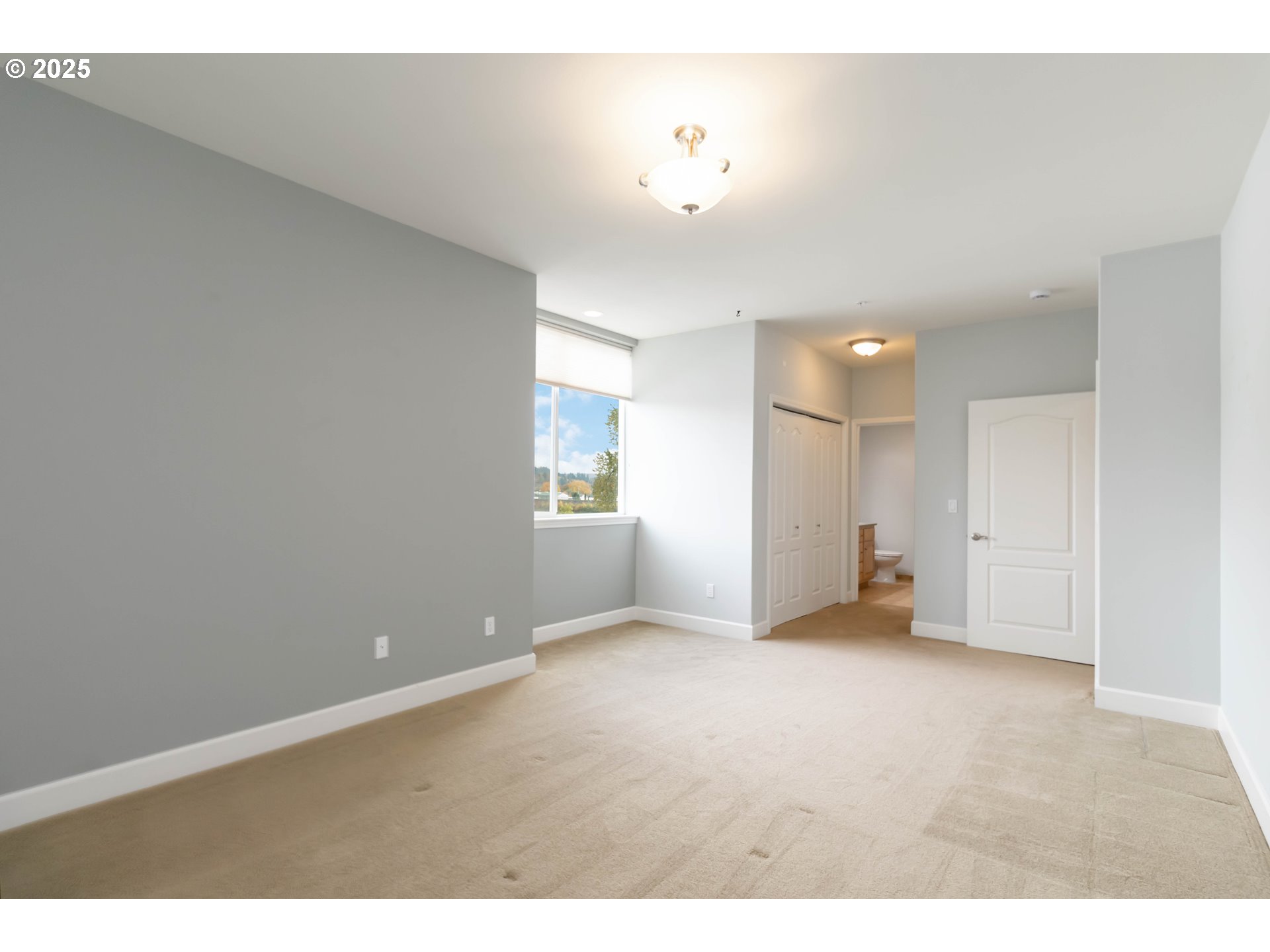 1548 River Road, Unit 302 Longview, WA 98632 - Photo 17 of 42 a view of an empty room with a window