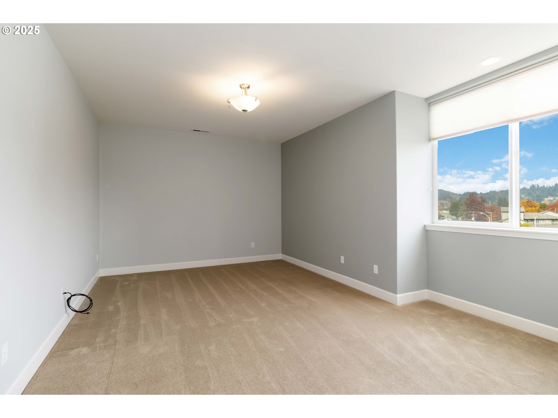 1548 River Road, Unit 302 Longview, WA 98632 - Photo 18 of 42 a view of an empty room with a window