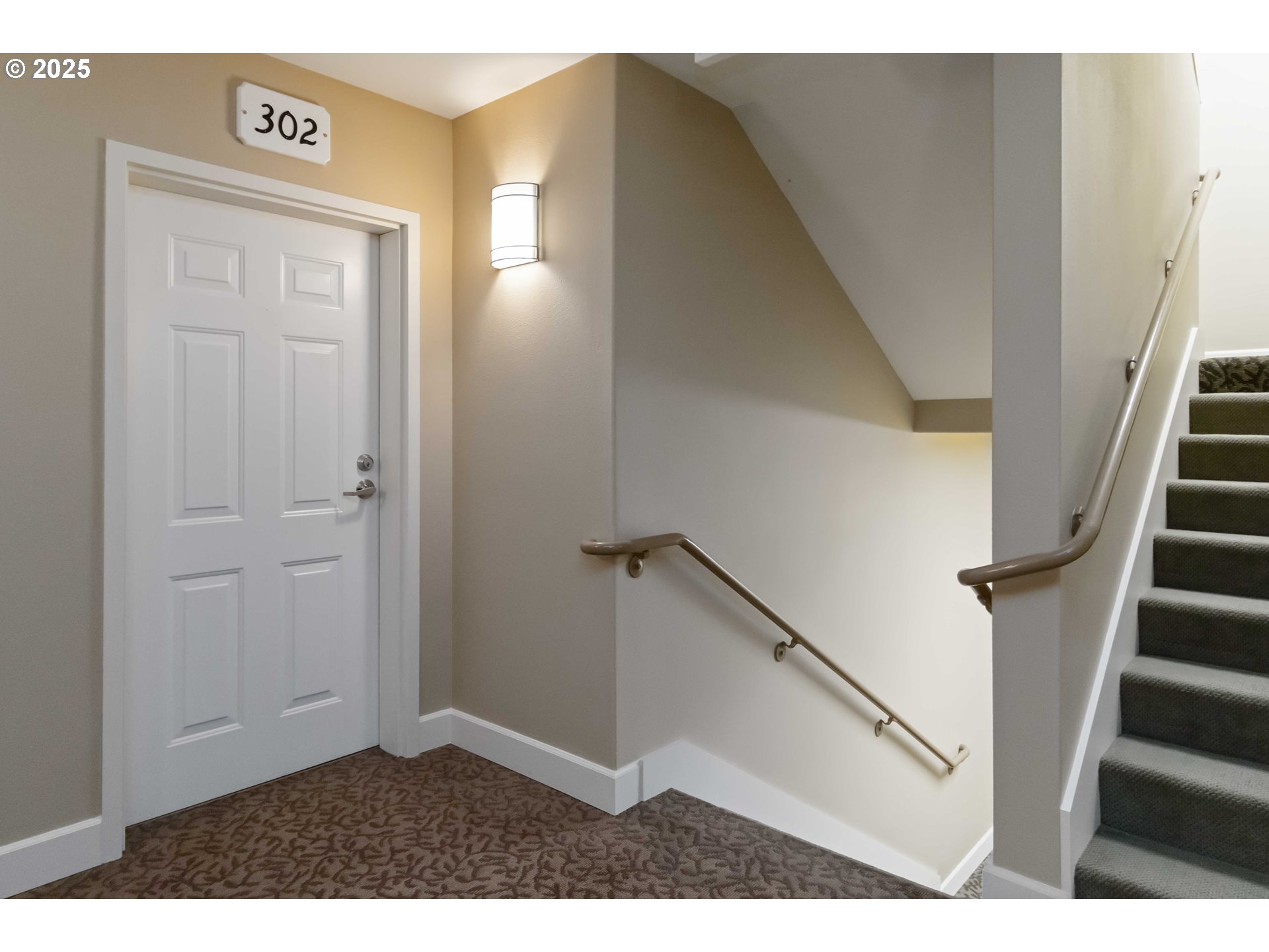 1548 River Road, Unit 302 Longview, WA 98632 - Photo 25 of 42 a view of a hallway with front door