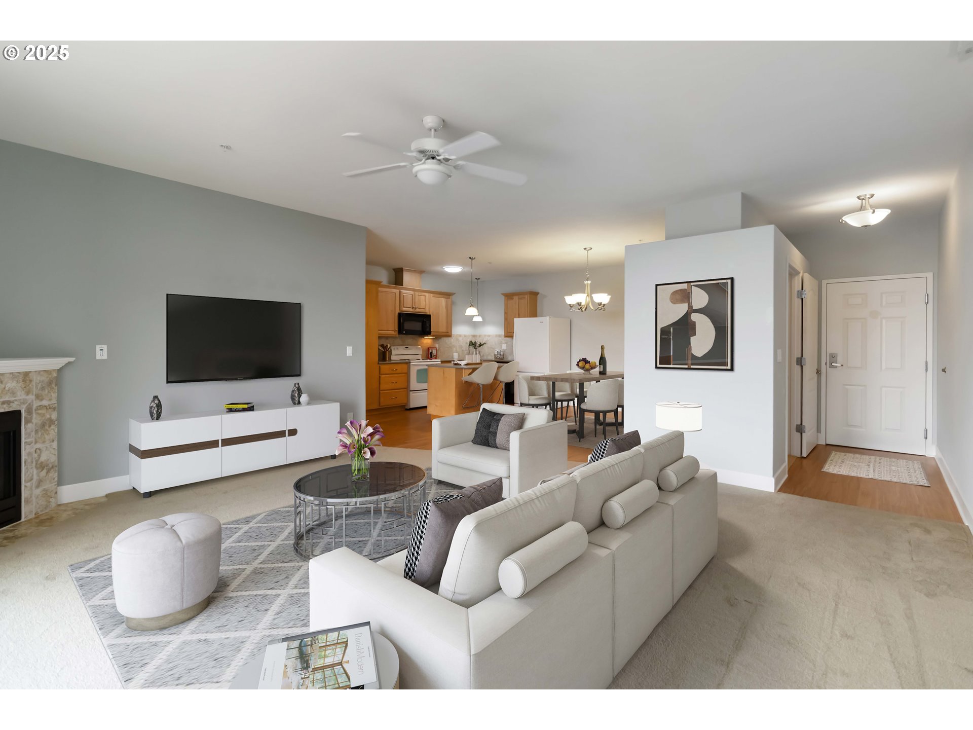 1548 River Road, Unit 302 Longview, WA 98632 - Photo 5 of 42 a living room with furniture and a flat screen tv