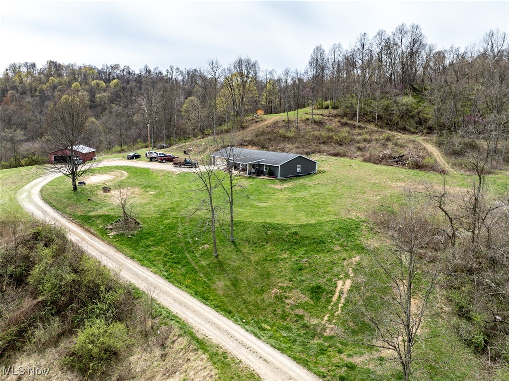 56567 Whiskey Run Road Quaker City, OH 43773 - Photo 40 of 43 Bird's eye view featuring a wooded view