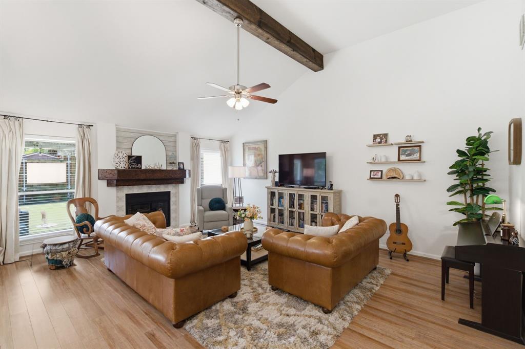 7801 Defender Lane Rowlett, TX 75089 - Photo 7 of 35 Wood mantel match wood beams