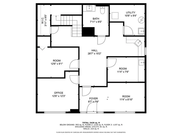 a dining table with chairs and window