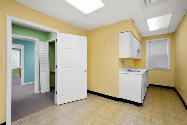 an empty room with windows