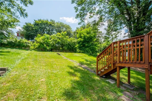 a view of a bench in a garden