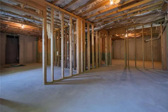 a view of a room with wooden walls