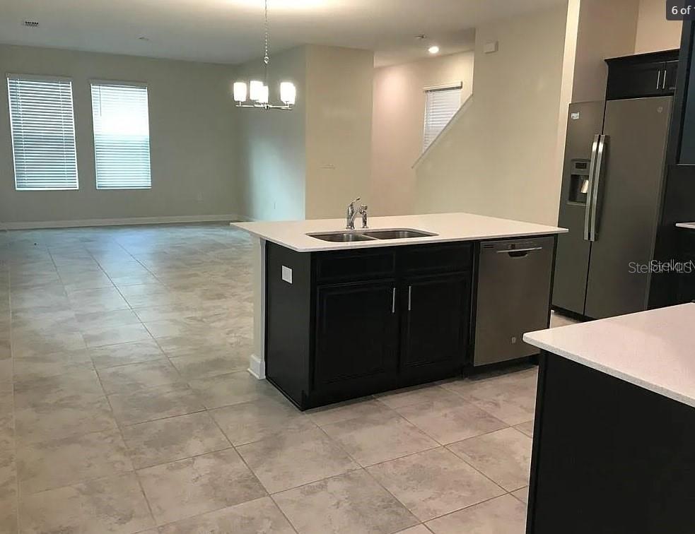 15187 Chapter Way Winter Garden, FL 34787 - Photo 5 of 17 a bathroom with a sink vanity and a mirror
