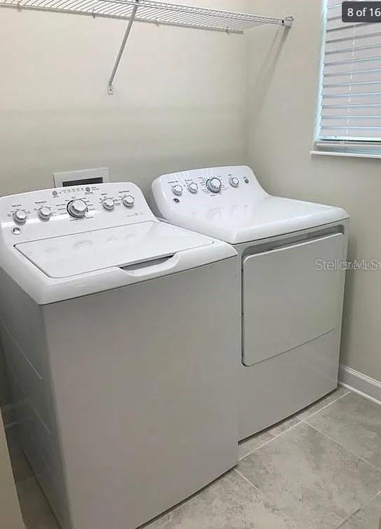 15187 Chapter Way Winter Garden, FL 34787 - Photo 7 of 17 a utility room with dryer and washer