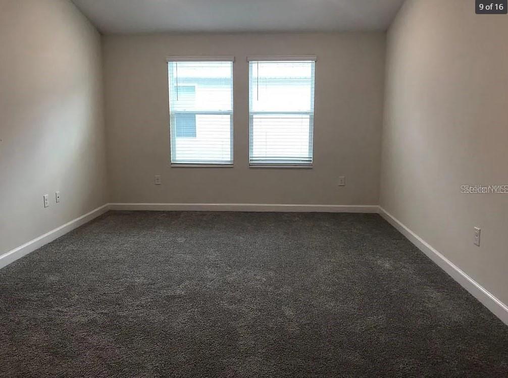 15187 Chapter Way Winter Garden, FL 34787 - Photo 8 of 17 an empty room with a window